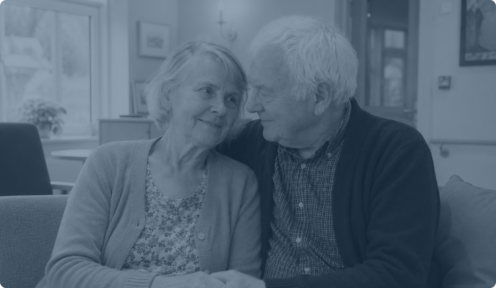 Two residents sharing a calm moment in a care home